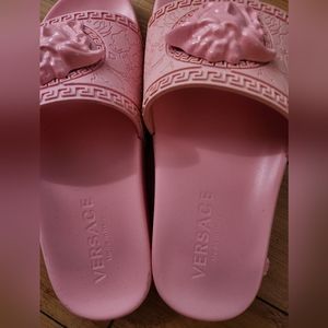 Used- Size 5 Versace Pink Palazzo slides. No box or dust bag.